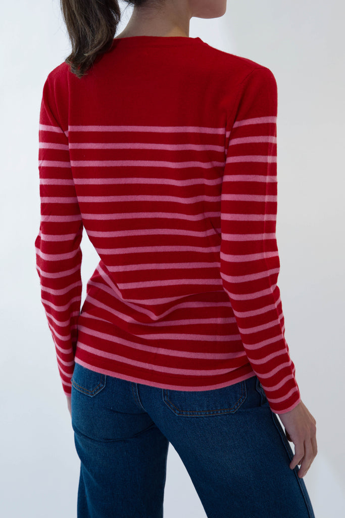 back of red and pink striped april sweater on model