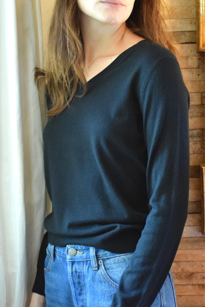 Side profile of andie pullover on model