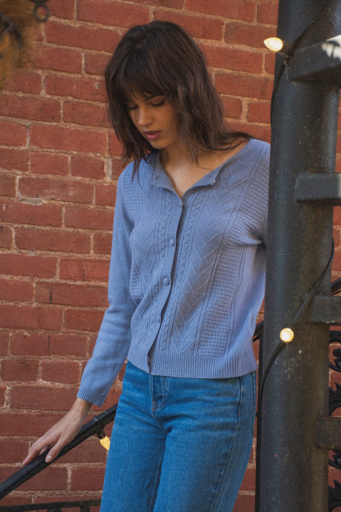 Woman wearing Brianne blue cardigan