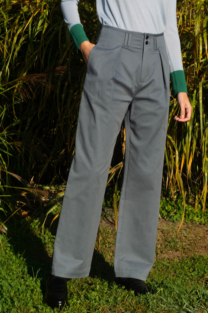 Woman wearing Ainsley grey dress pants