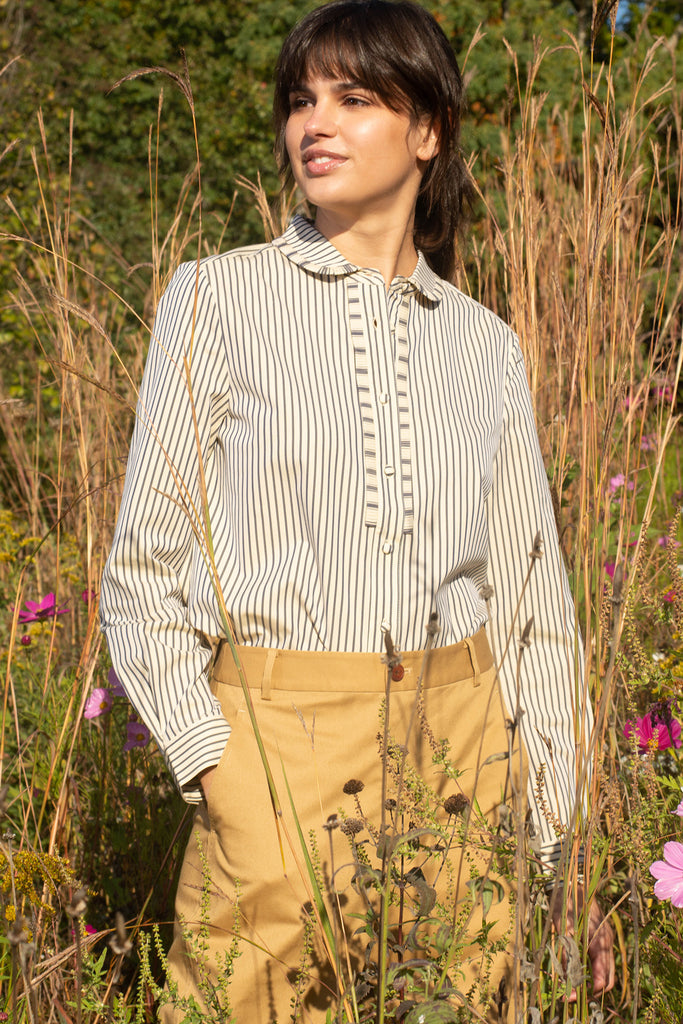 Woman wearing Carrie striped blouse