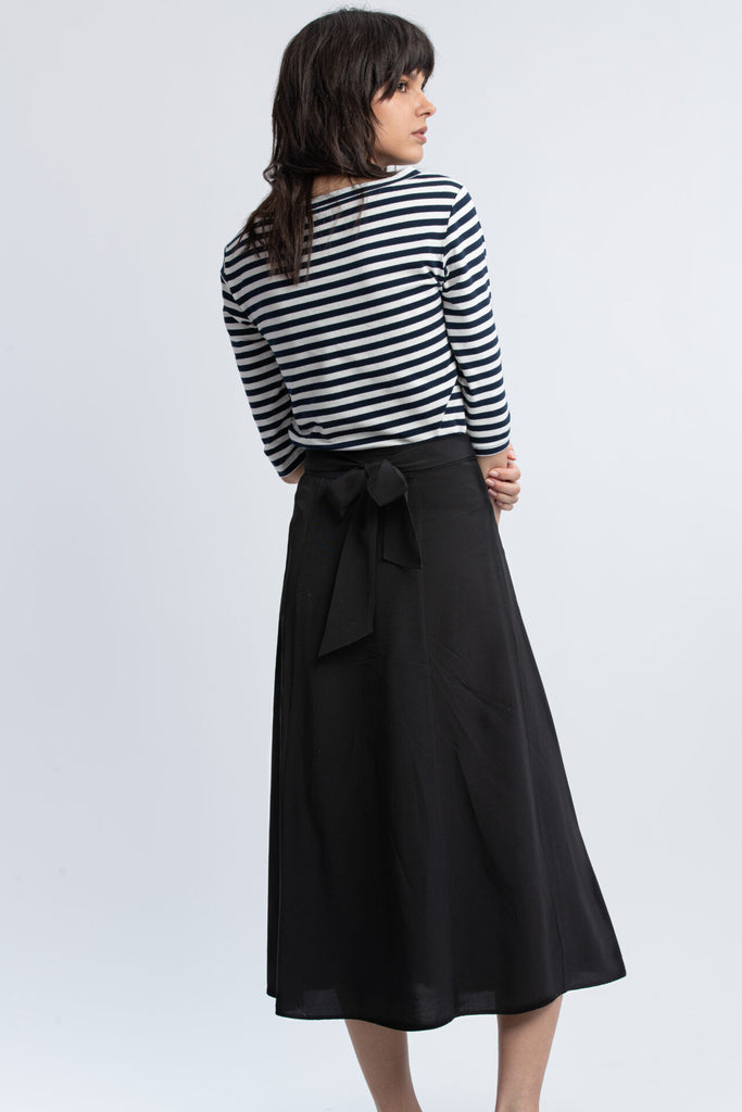 woman wearing Grace Black Midi Skirt