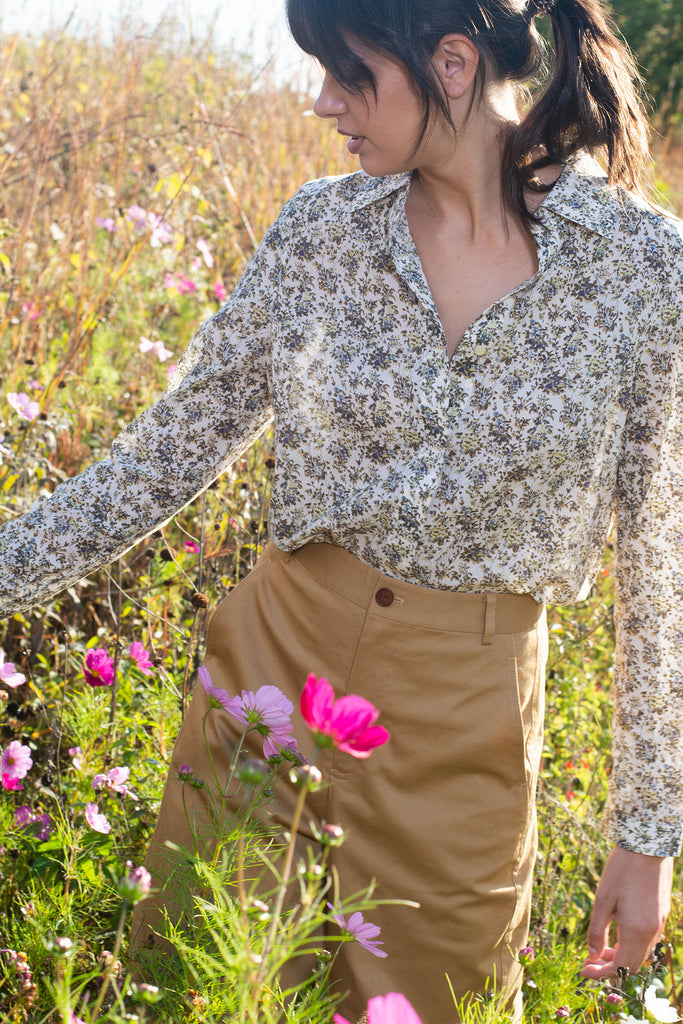 Woman wearing Raegan floral cotton blouse 