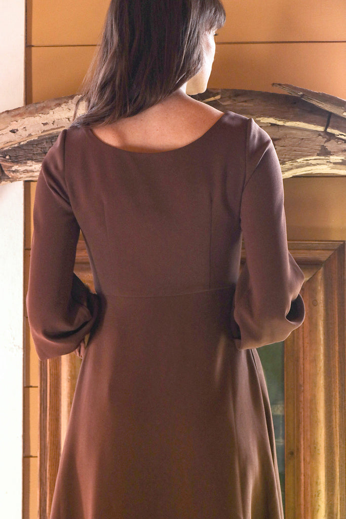 Woman wearing Tarryn long sleeve sweetheart dress